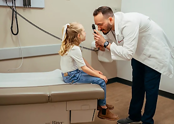 AFC Urgent Care Vancouver - Vancouver, WA Urgent Care Clinics - Doctor With Patient Image