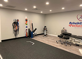 Adam Blankenberger, DPT - REHABILITATION & PERFORMANCE INSTITUTE - Evansville, IN Physical Therapists - Clinic Interior Image