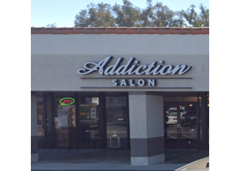 Orange hair salon Addiction Salon