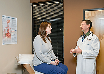 Amir Harari, MD, FACE, ECNU - Scottsdale, AZ Endocrinologists - Doctor With Patient Image