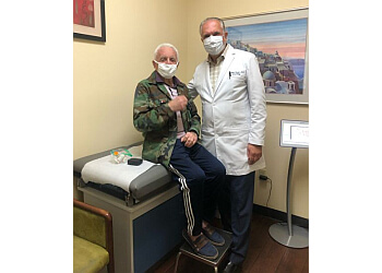 Armen J Cherik, MD, MBA, DABPN - Glendale, CA Neurologists - Doctor With Patient Image