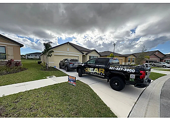Bear Roofing Bear Roofing - Palm Bay, FL Roofing Contractors - Truck Image