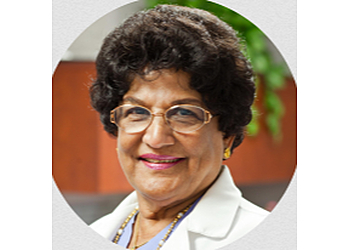 Bhanu J Shah, MD - WOMAN TO WOMAN CARE CENTER Sterling Heights Gynecologists image 1