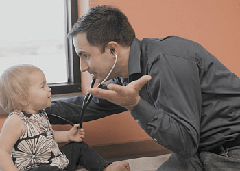 Blake W. Barnes, MD, FAAP - Columbia, MO Pediatricians - Doctor Working Image