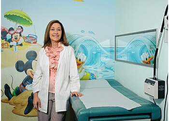 Blanca Fresno, MD, FAAP - Chula Vista, CA Pediatricians - Doctor Working Image