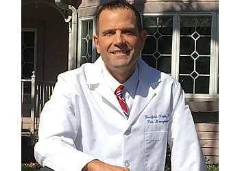 Bradford R. Noble, DO, FAOCPMR - NOBLE PAIN MANAGEMENT Columbia Pain Management Doctors