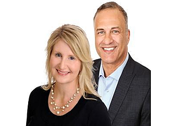 Carson & Lisa Lowry - RE/MAX REVOLUTION Evansville Real Estate Agents image 1