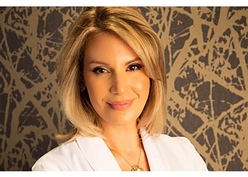 Houston dermatologist Catherine Papasakelariou, MD - Houston Premier Dermatology