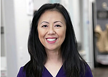 Cher Chang, DMD, FICOI, FAAIP - AFFORDABLE DENTURES & IMPLANTS Las Vegas Dentists image 1