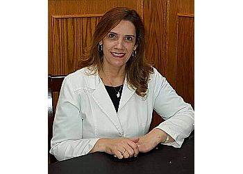 Claudia M. Rodriguez-Pena, DDS - ELITE SMILE