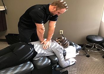 Overland Park Chiropractors Dr. Brad M. Woodle, DC, CCSP, FASA, CSCS - ADVANCED SPORTS & FAMILY CHIROPRACTIC & ACUPUNCTURE