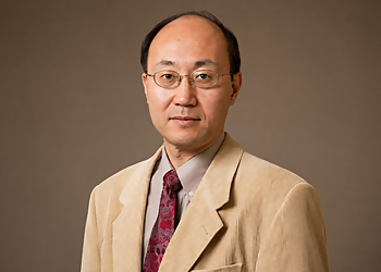 Dali Chen, MD, PhD, FACE - Tacoma, WA Endocrinologists - Doctor Portrait Image