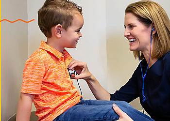David N Holleman, MD - Kansas City, MO Pediatricians - Doctor With Patient Image