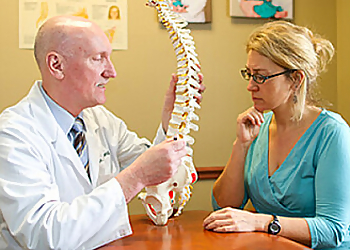 David Nebbeling DO - Lansing, MI Pain Management Doctors - Doctor With Patient Image