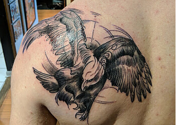 Buffalo tattoo shop Divine Machine Tattoo