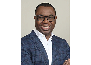Dr. Adebowale (Debo) Adegbenro, DC - COMPREHENSIVE SPINE & SPORTS CENTER Warren Chiropractors image 1
