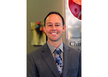 Dr. Brad M. Woodle, DC, CCSP, FASA, CSCS - ADVANCED SPORTS & FAMILY CHIROPRACTIC & ACUPUNCTURE Overland Park Chiropractors