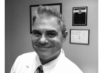 Dr. Bryan Schuetz, DC - Capital City Chiropractic