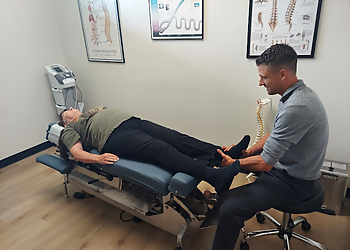 Green Bay Chiropractors Dr. Dylan Wenzel, DC - HEALTH IN MOTION CHIROPRACTIC