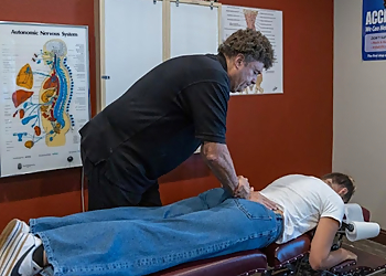Dr. Jerry S. Clark, DC - Provo, UT Chiropractors - Doctor With Patient Image