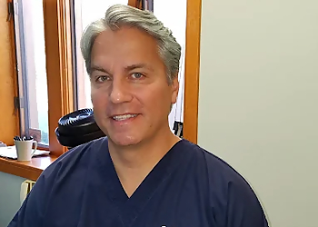 Dr. John Lafayette Dallas, B.Sc., D.C., C.C.S.P - DALLAS CHIROPRACTIC RELIEF PLC Lansing Chiropractors image 1