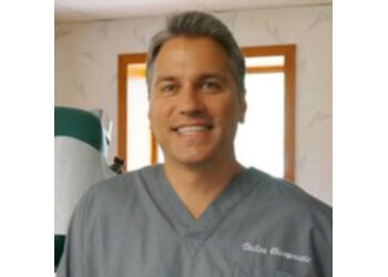 Dr. John Lafayette Dallas, DC - Dallas Chiropractic Relief PLC Lansing Chiropractors