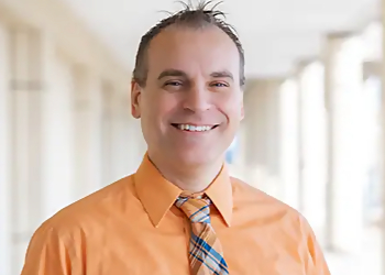Dr. Karoly Toth, DC - Syracuse, NY Chiropractors - Doctor Portrait Image