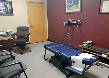 Davenport Chiropractors Dr. Mark Schmall, D.C- SPINE, SPORT AND INJURY THERAPY CENTER