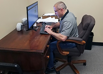 Davenport Chiropractors Dr. Mark Schmall, D.C- SPINE, SPORT AND INJURY THERAPY CENTER