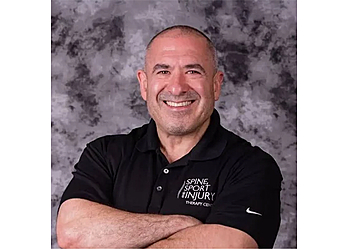 Davenport Chiropractors Dr. Mark Schmall, D.C- SPINE, SPORT AND INJURY THERAPY CENTER