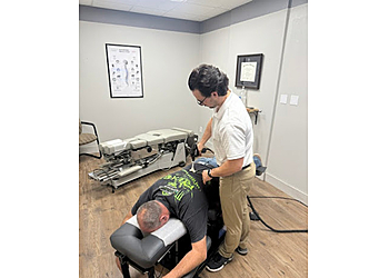 Flint Chiropractors Dr. Michael Weiss, DC - ENHANCED CHIROPRACTIC