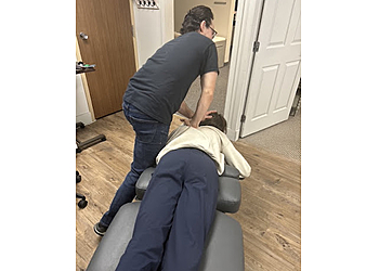 Flint Chiropractors Dr. Michael Weiss, DC - ENHANCED CHIROPRACTIC