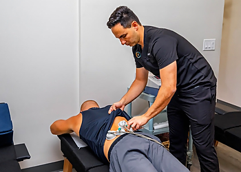 Dr. Misa Zaker, DC - Torrance, CA Chiropractors - Doctor With Patient Image