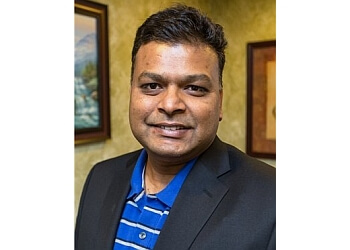 Rajubhai M. Patel, DDS - Advanced Dental Center Elizabeth Dentists