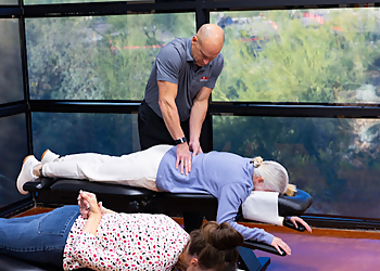 Dr. Scott Mitchell, DC - Peoria, AZ Chiropractors - Doctor With Patient Image