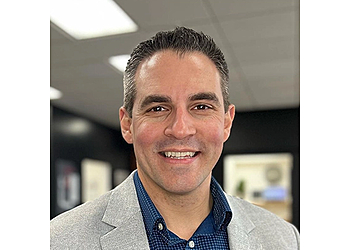 Davenport Chiropractors Dr. Sinan Gocmen D.C. - ABUNDANT HEALTH PHYSICAL MEDICINE