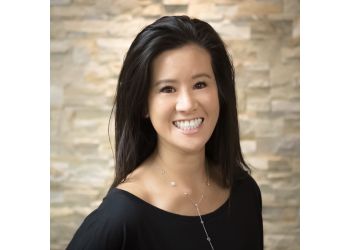 Dr. Stephanie Woo, DC, MBA - CHIROPRACTIC CONCEPT OF BELLEVUE