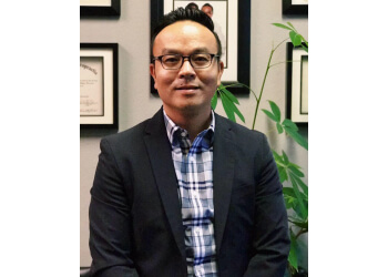 Dr. Tien Adrian Trinh, DC - TRICARE CHIROPRACTIC, P.A. 