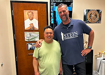 Dr. Torsten Stein, DC - Glendale, AZ Chiropractors - Doctor With Patient Image