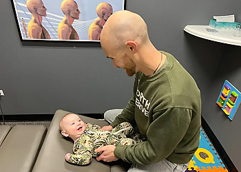 Aurora Chiropractors Dr. Zac Cummins, DC- INFINITY WELLNESS CENTER