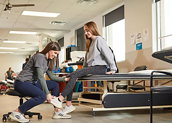 Emily Jackson, PT, DPT - NOVACARE REHABILITATION JOLLY ROAD - Lansing, MI Physical Therapists - Clinic Interior Image