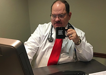 Ernesto Malave, MD - Killeen, TX Primary Care Physicians - Doctor Working Image