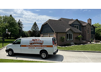 Home Exteriors of Michigan Home Exteriors of Michigan - Livonia, MI Roofing Contractors - Service Vehicle Image