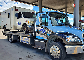 Hook N Book Towing LLC. Kansas City Towing Companies Hook N Book Towing LLC.