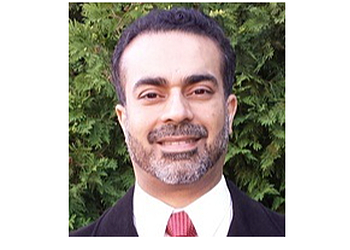 J. Bhui, DMD - ELITE DENTISTRY Vancouver Dentists image 1