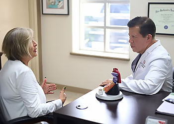 Jaime Silva, MD, P.A. - Brownsville, TX Cardiologists - Doctor With Patient Image