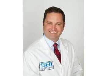 James S. Forage, MD - THE SPINE AND BRAIN INSTITUTE