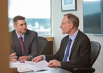 James W. Radig - Cedar Rapids, IA Real Estate Lawyers - Office Meeting Image