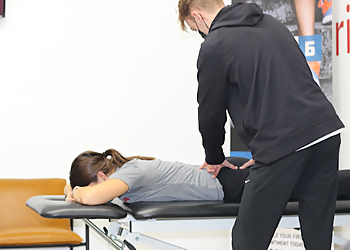 Jason Gearhart, PT, DPT, CSCS - VITAL SIX PHYSICAL THERAPY & PERFORMANCE - Kansas City, MO Physical Therapists - Doctor With Patient Image