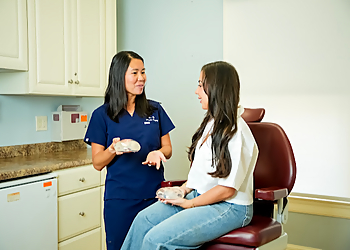 Joanna H. Ng-Glazier, MD - Worcester, MA Plastic Surgeons - Patient Consultation Image